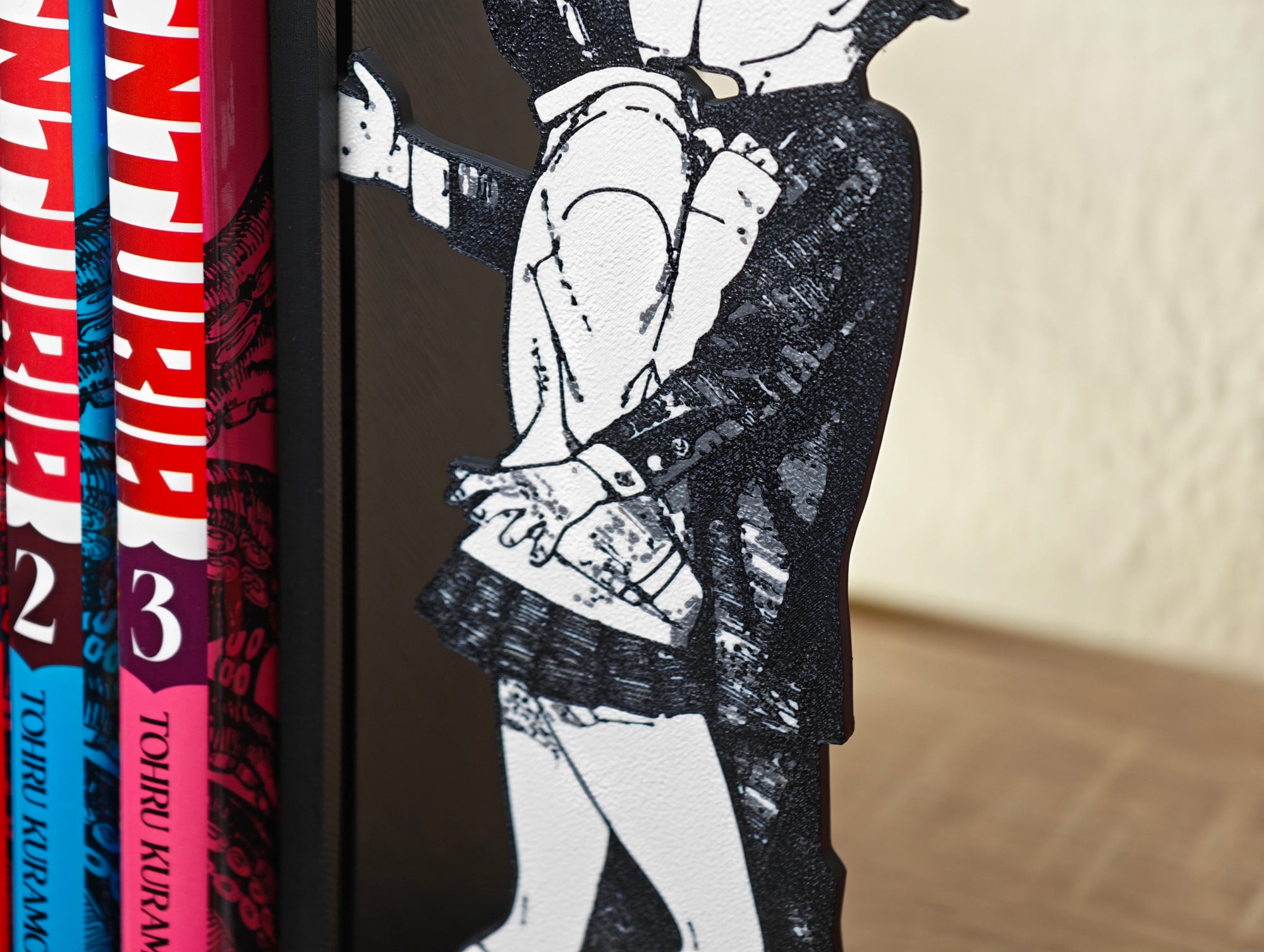 Sujetalibros del beso de Momo y Okarun