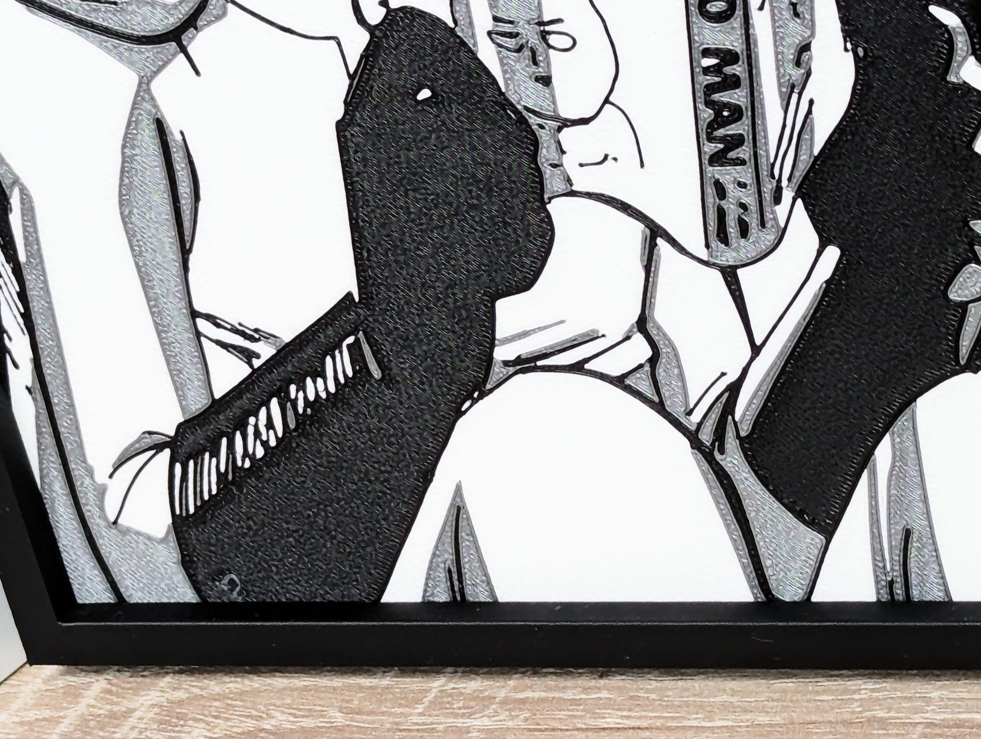 Sujetalibros de Saitama leyendo manga